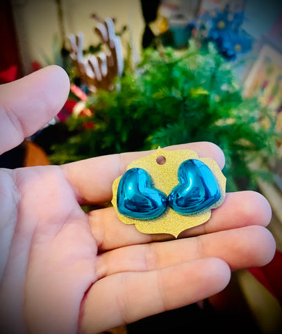 Metallic blue heart stud earrings