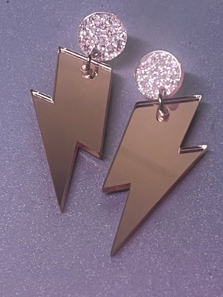Pink lightening bolt earrings