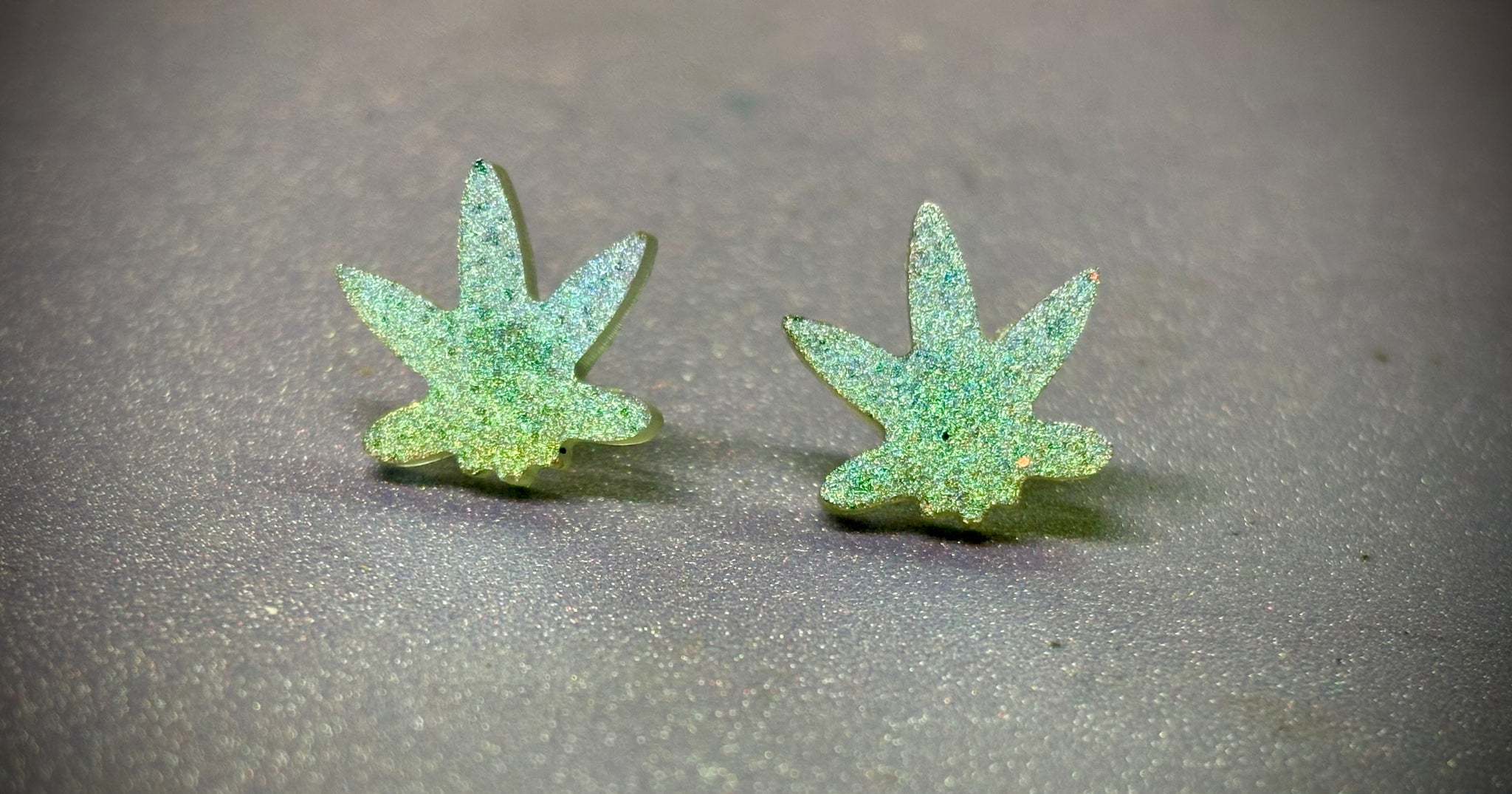 Holographic pot leaf stud earrings