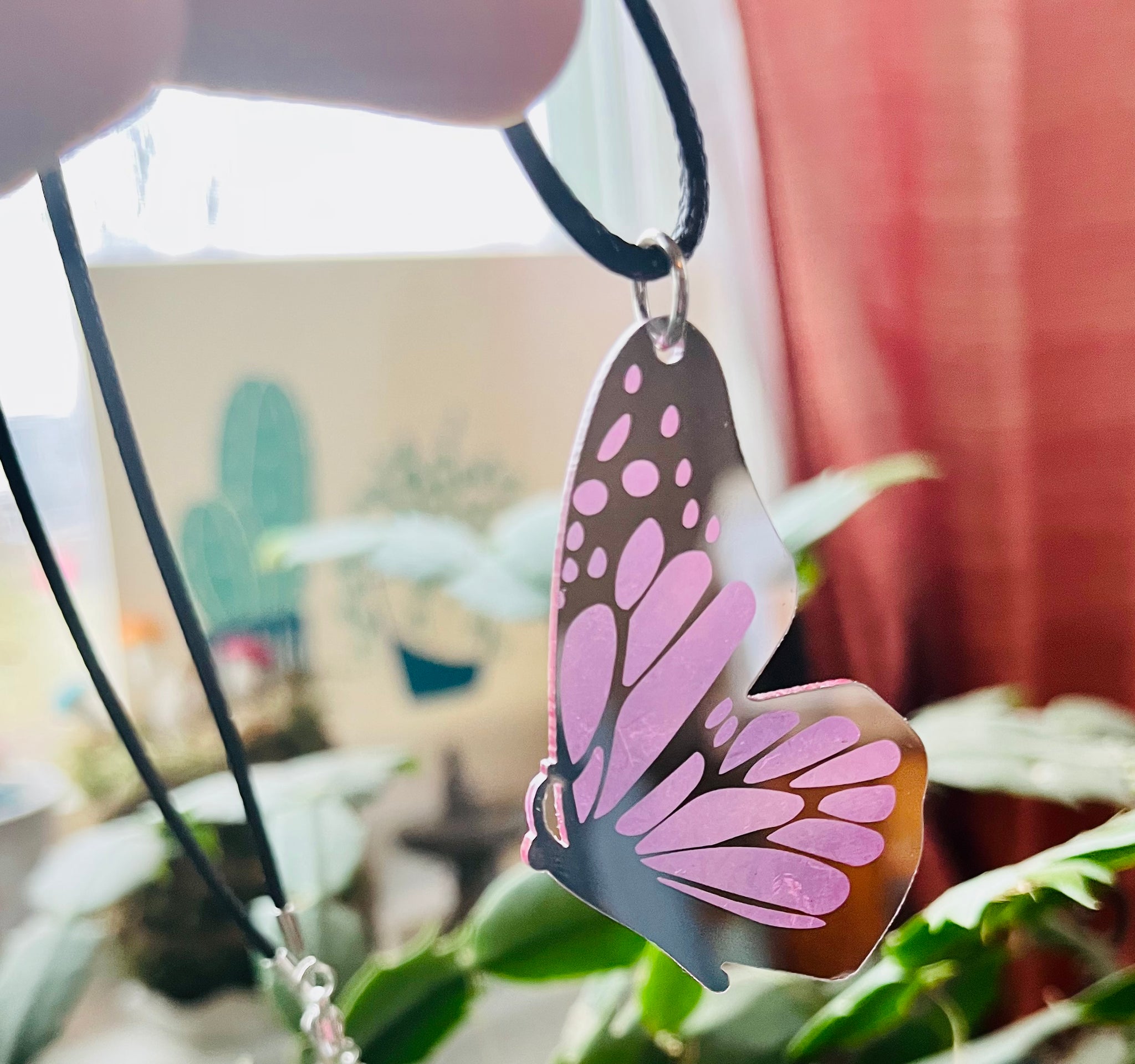 Mirrored butterfly necklace