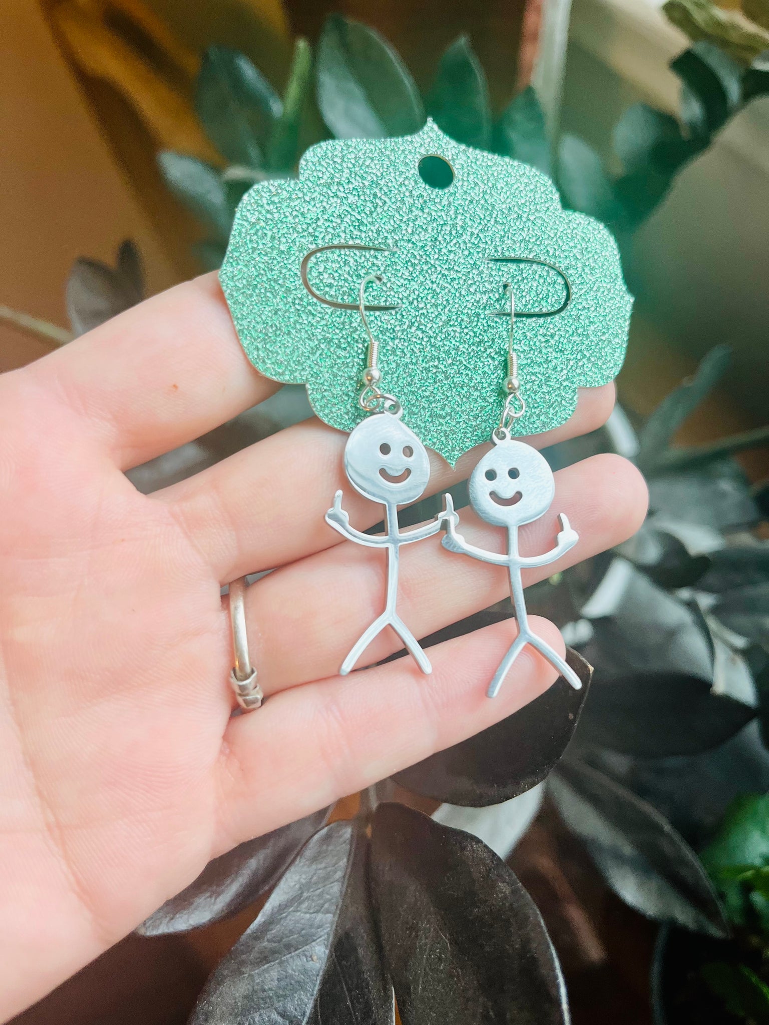 Flipping the bird earrings