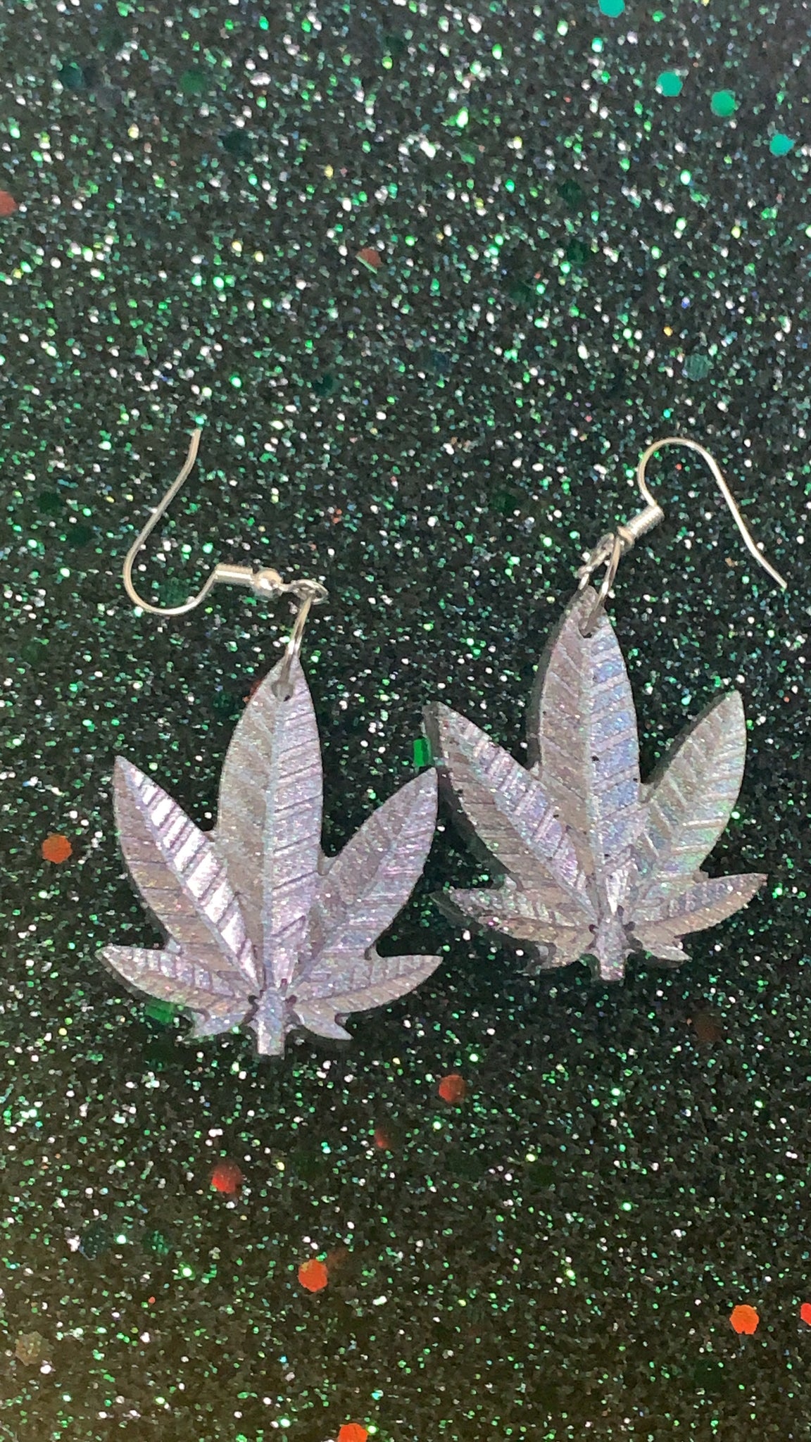 Holographic pot leaf dangles